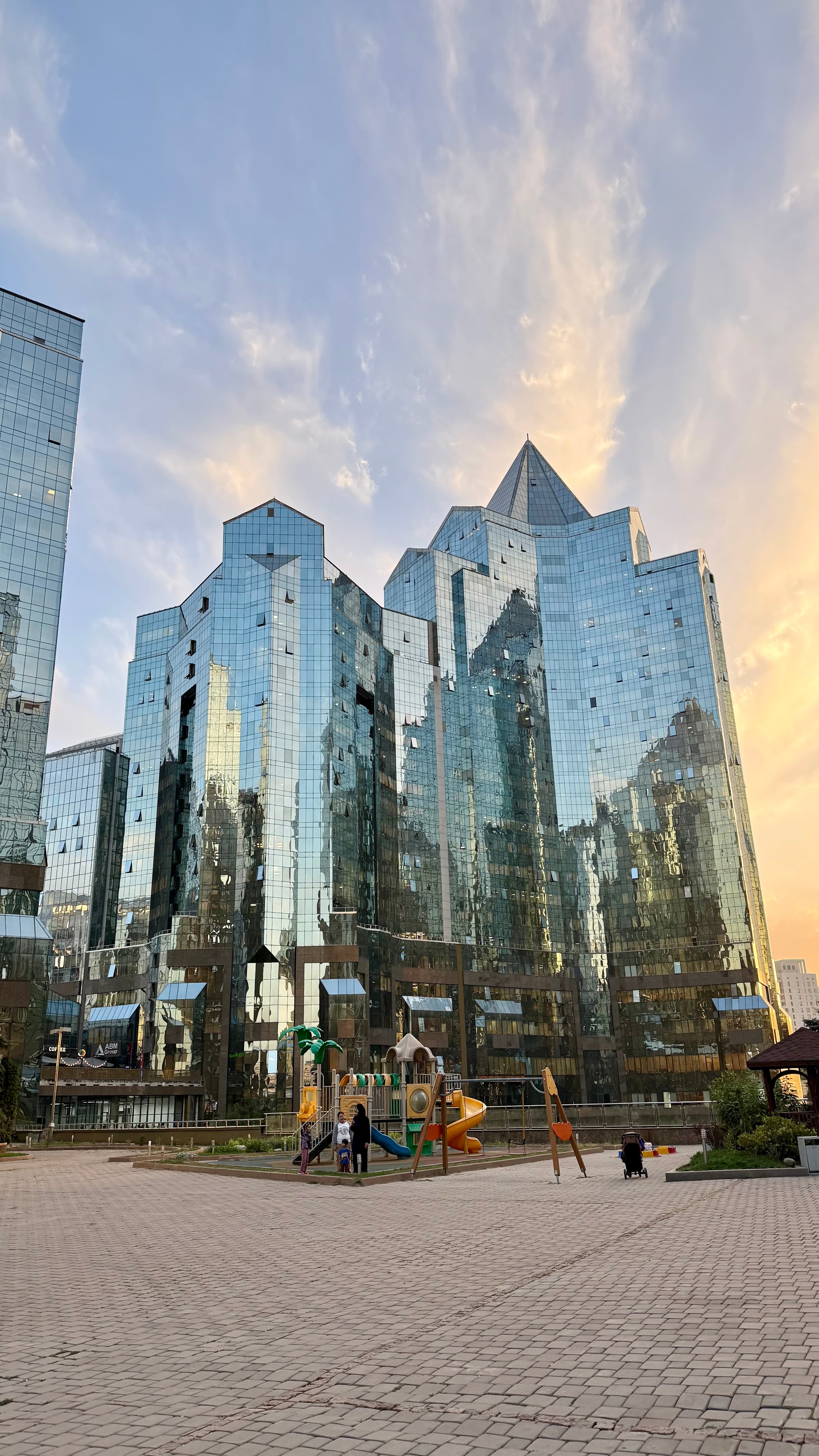 Sunset reflecting off a building complex in Almaty, Kazakhstan