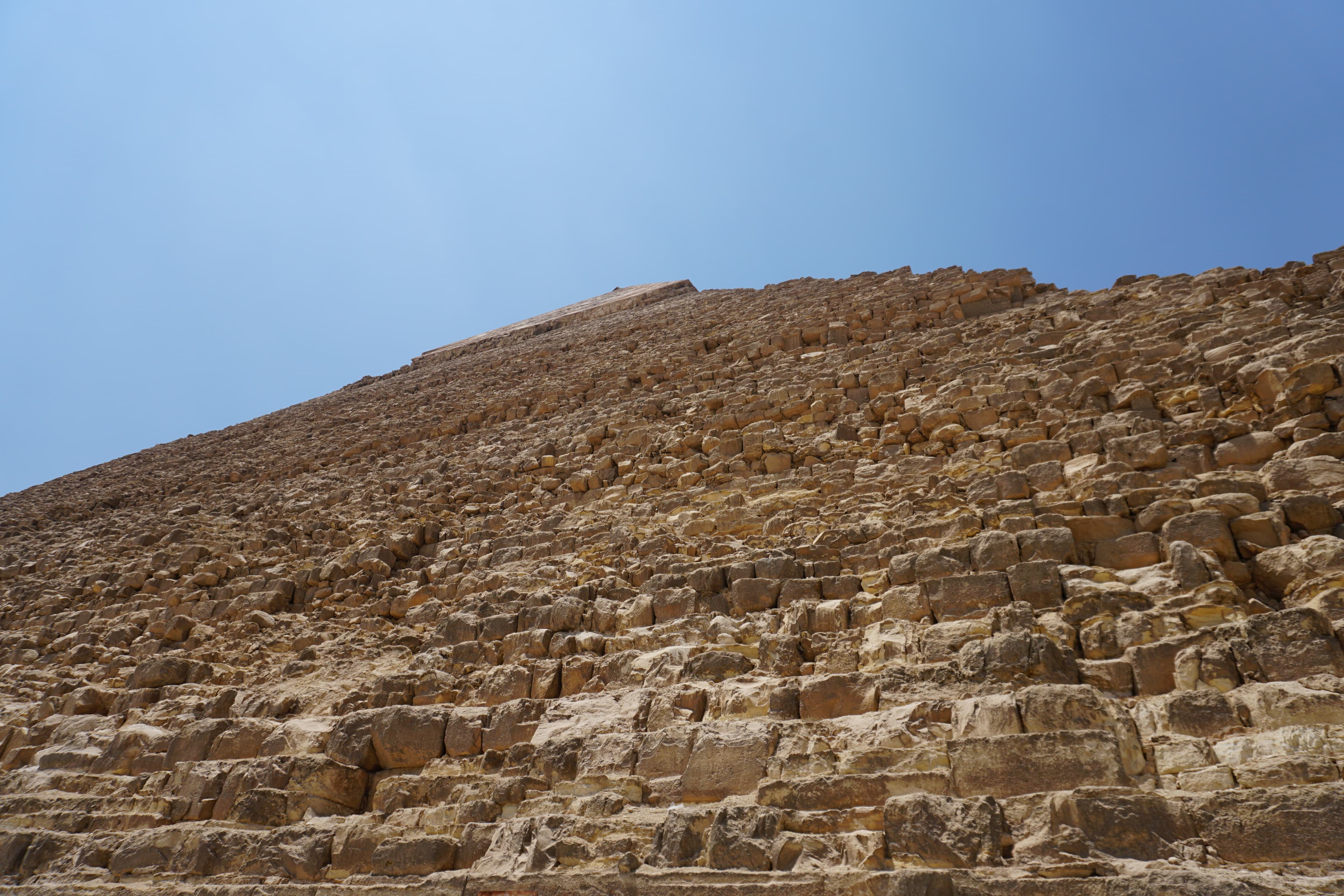 The massive limestone blocks of the Great Pyramid seen up close at Giza