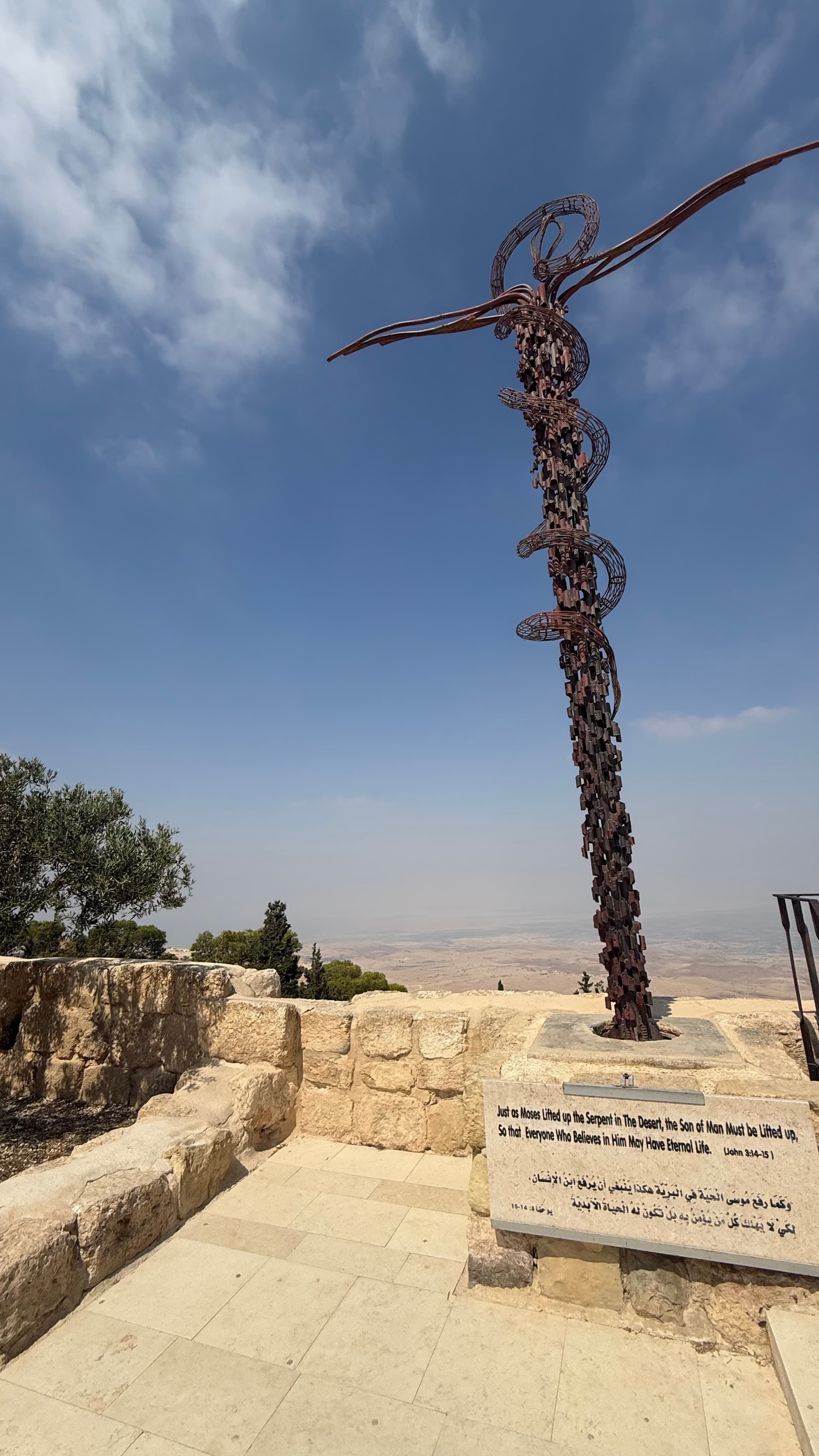 The abstract Serpentine Cross on the summit of Mount Nebo, recalling the staff of Moses