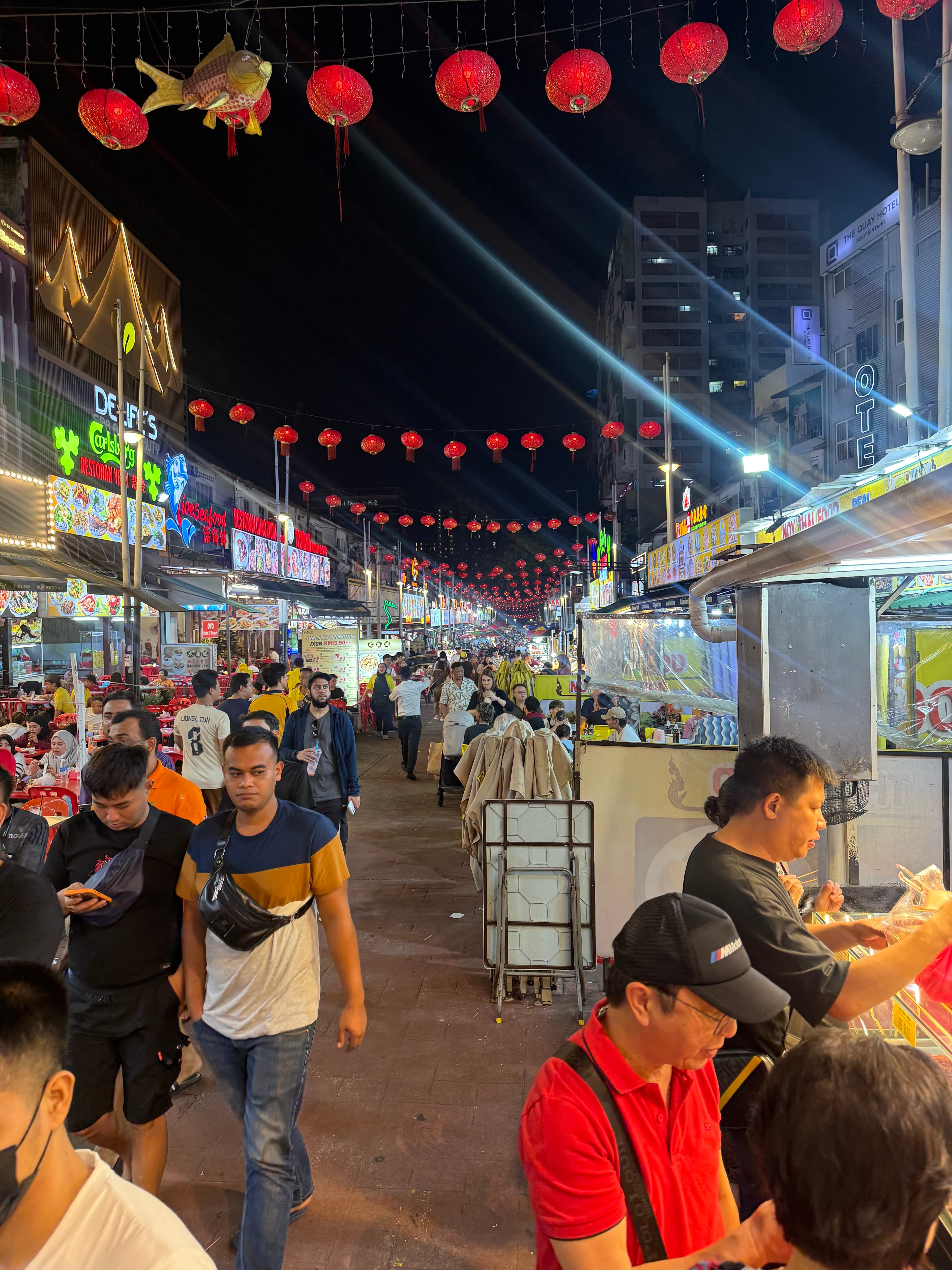 Night food stalls at a street market in Kuala Lumpur