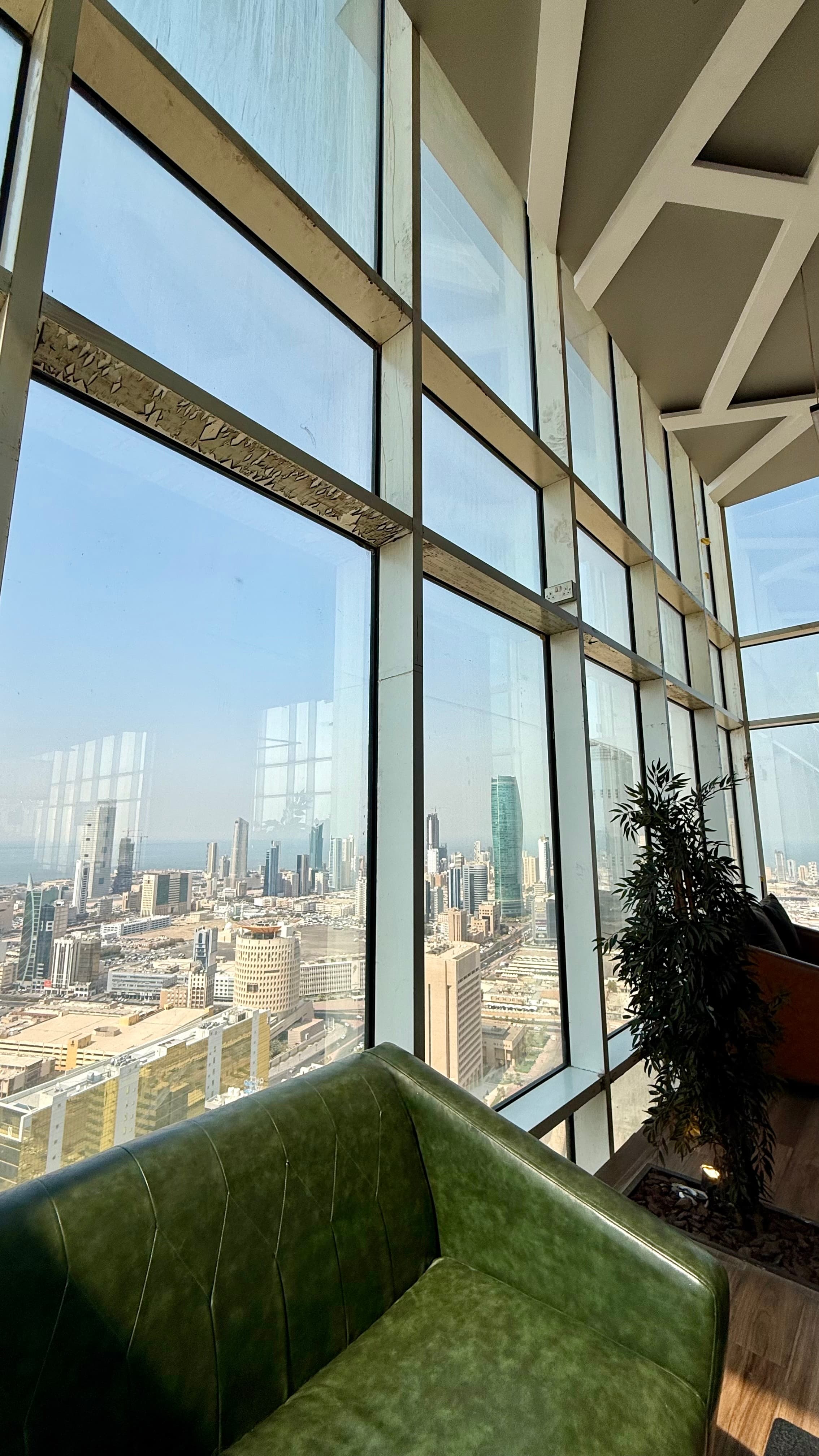 A shisha lounge overlooking the Kuwait City skyline at night