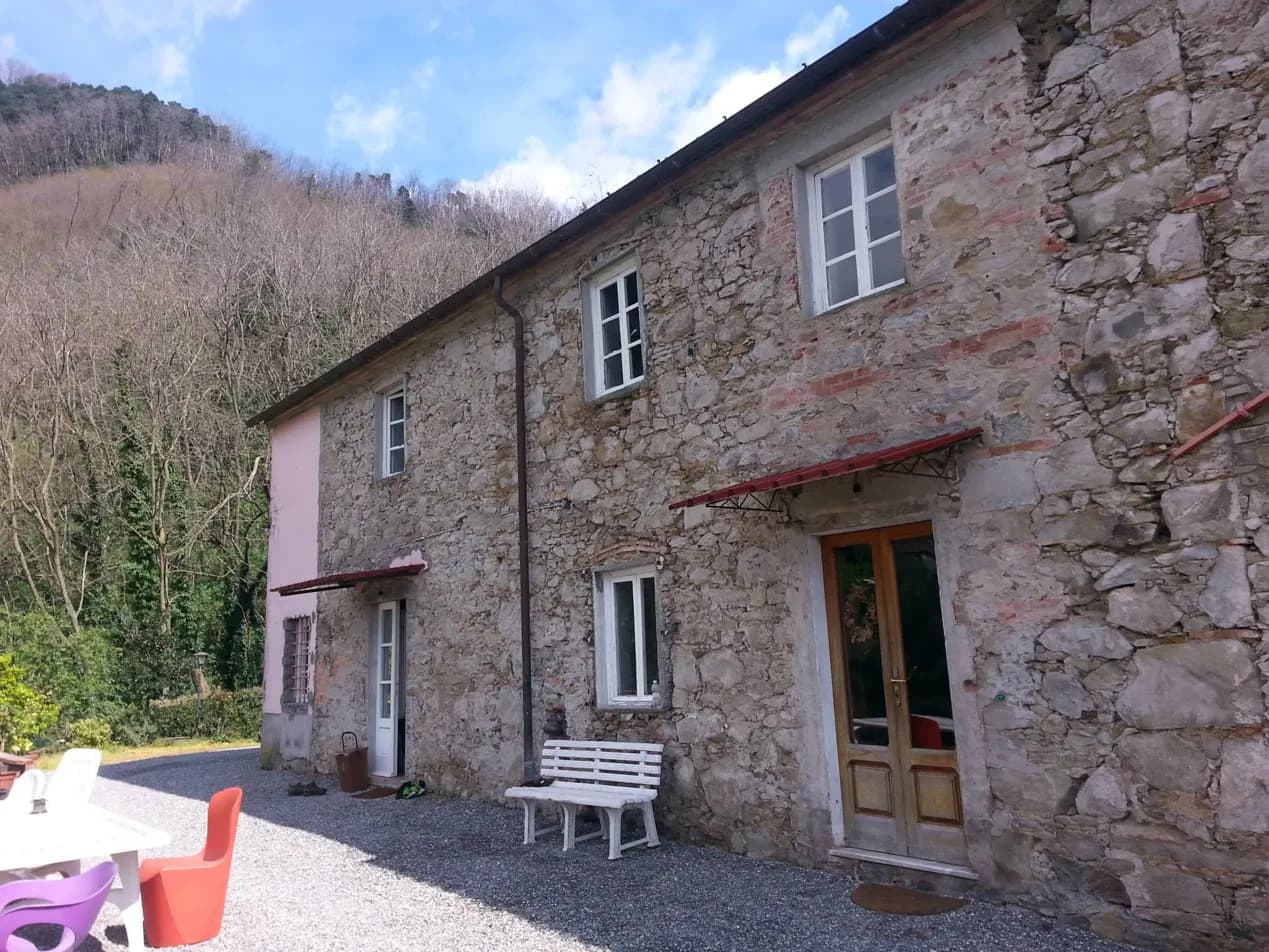 The restored stone farmhouse at Azienda Agricola Forestaria in the hills of Matraia