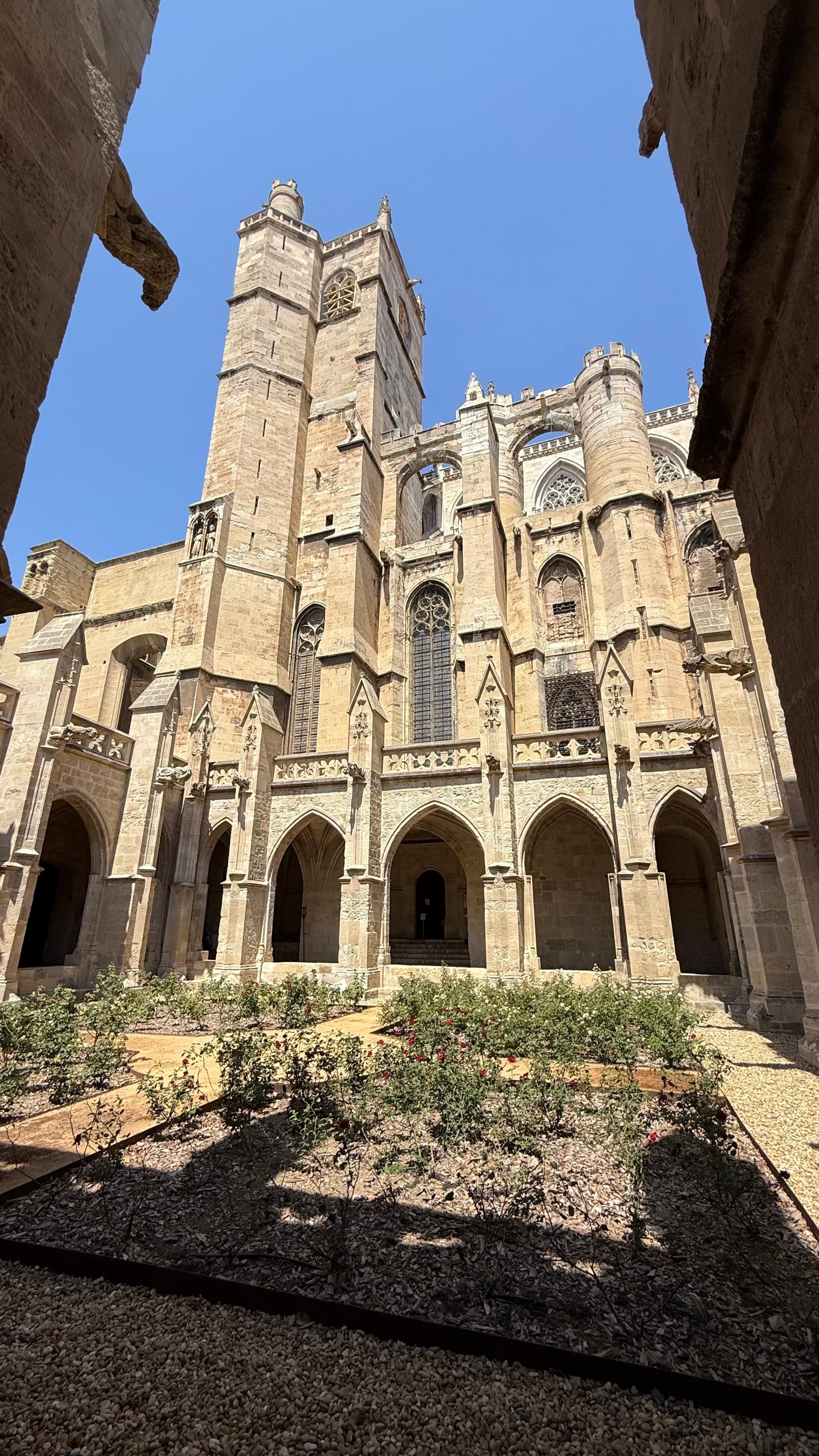 A stone church in the medieval old town of Narbonne, France