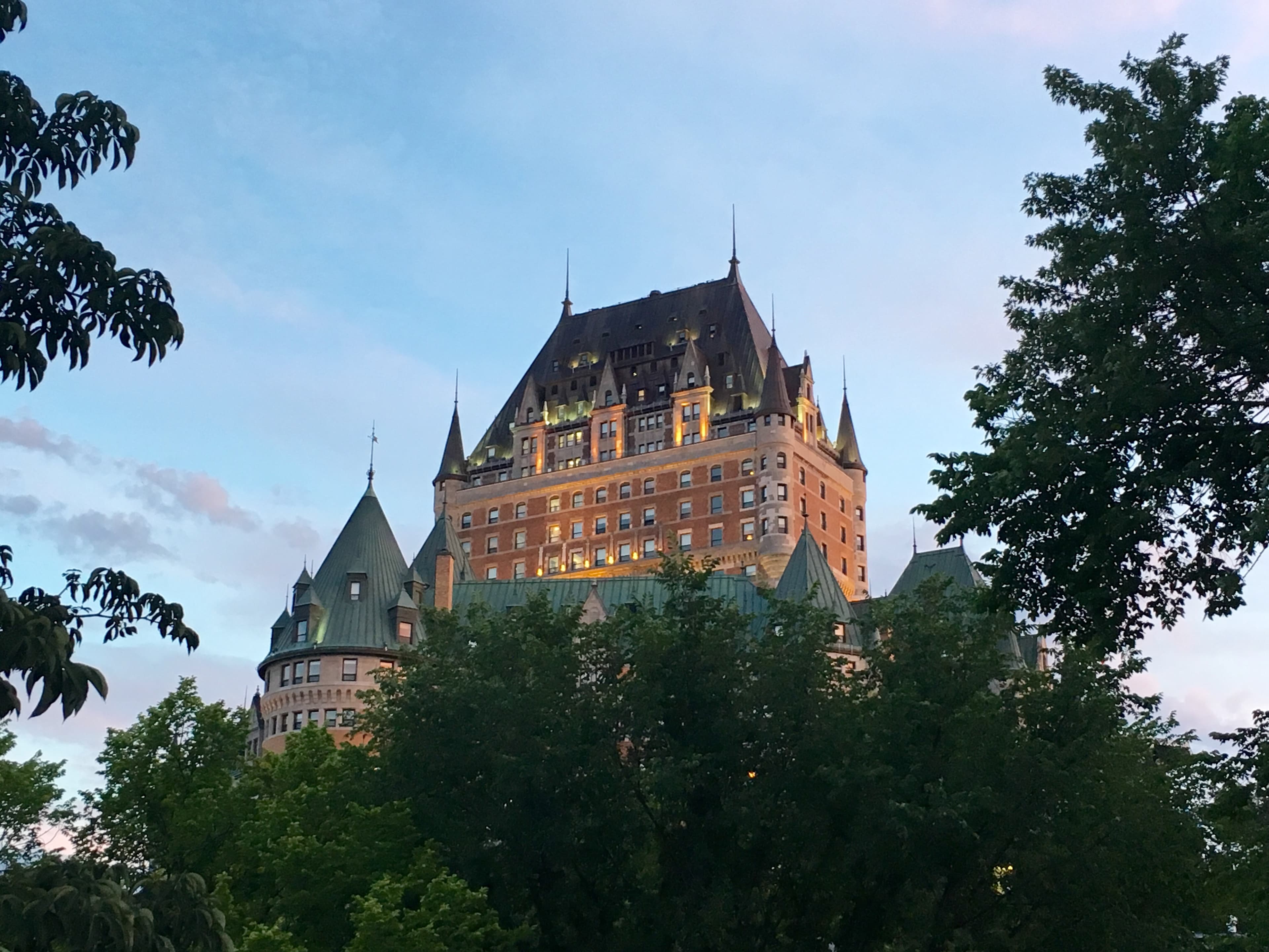 The Château Frontenac hotel rising above the cliff and the St. Lawrence River in Québec City