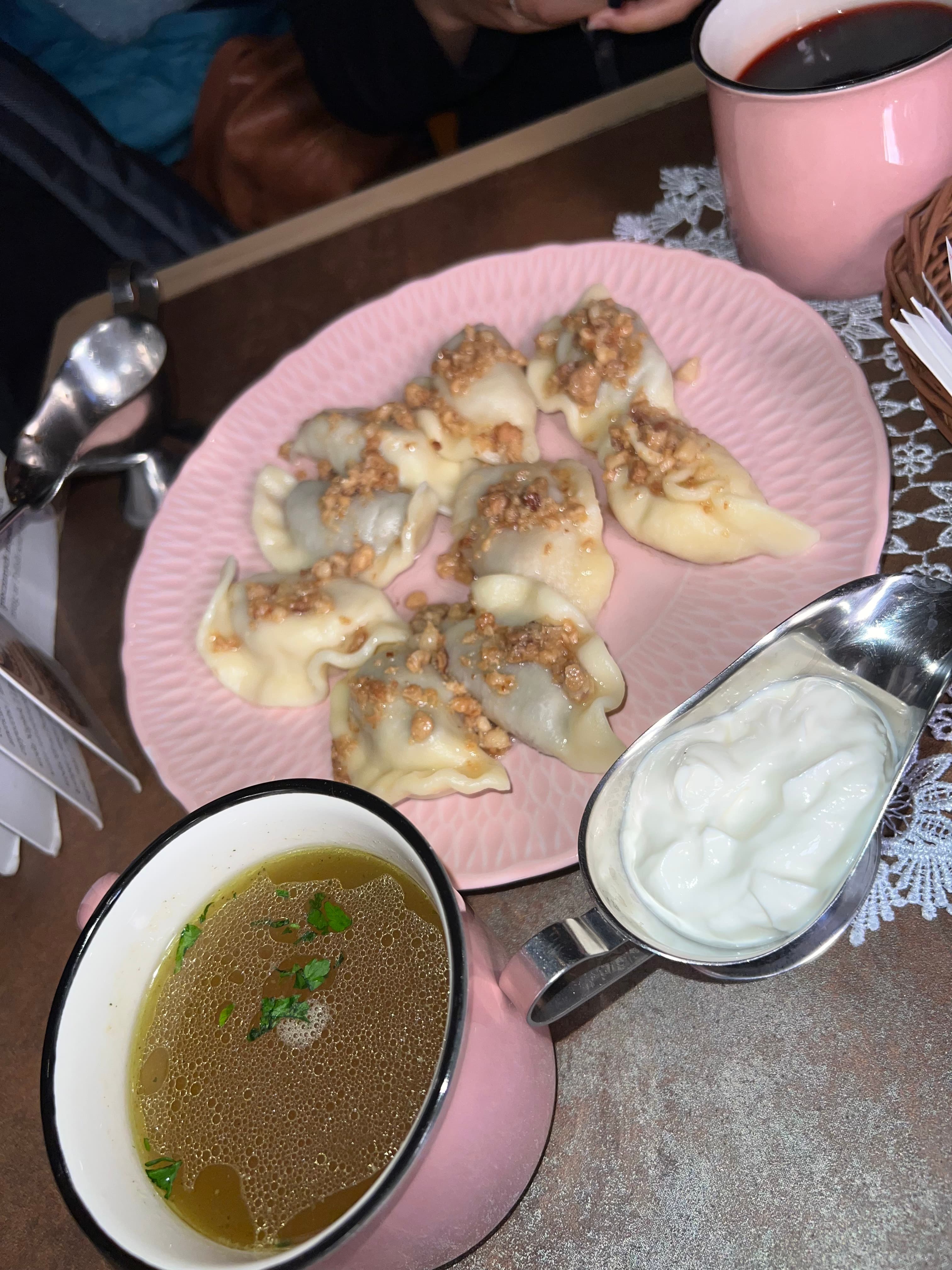 A plate of Polish pierogi dumplings served in Warsaw