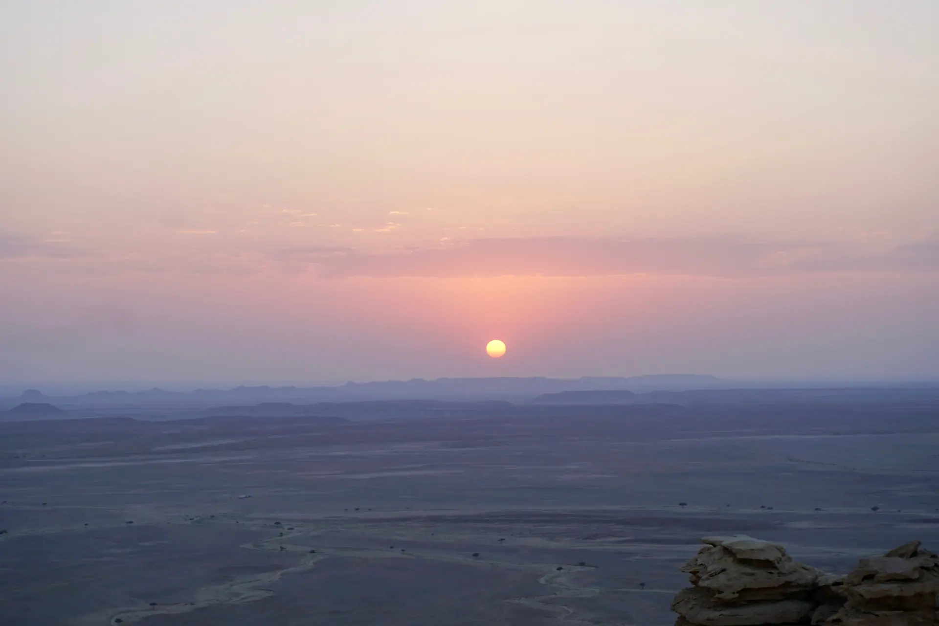 Viator Modus travel creator overlooking a sweeping landscape — homepage hero